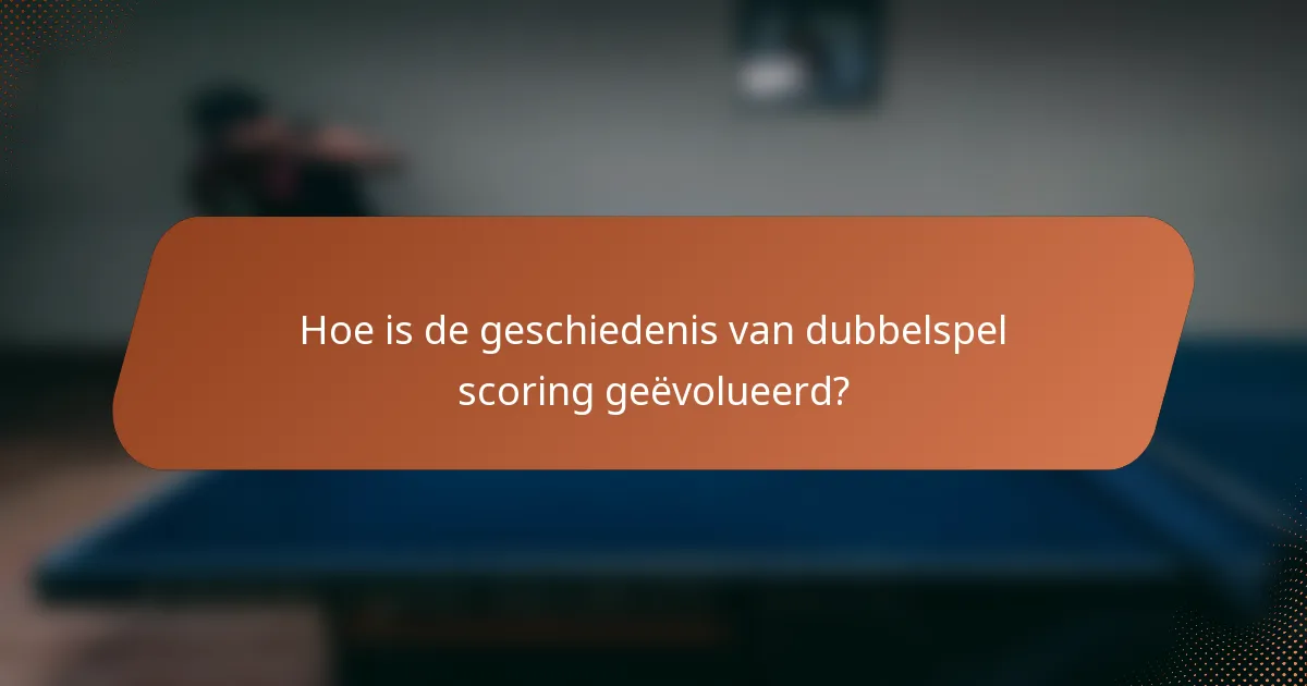 Hoe is de geschiedenis van dubbelspel scoring geëvolueerd?
